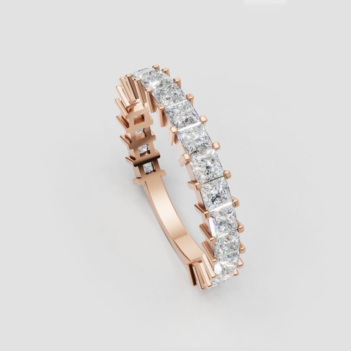 Cushion cut diamond band showing detailed prong setting