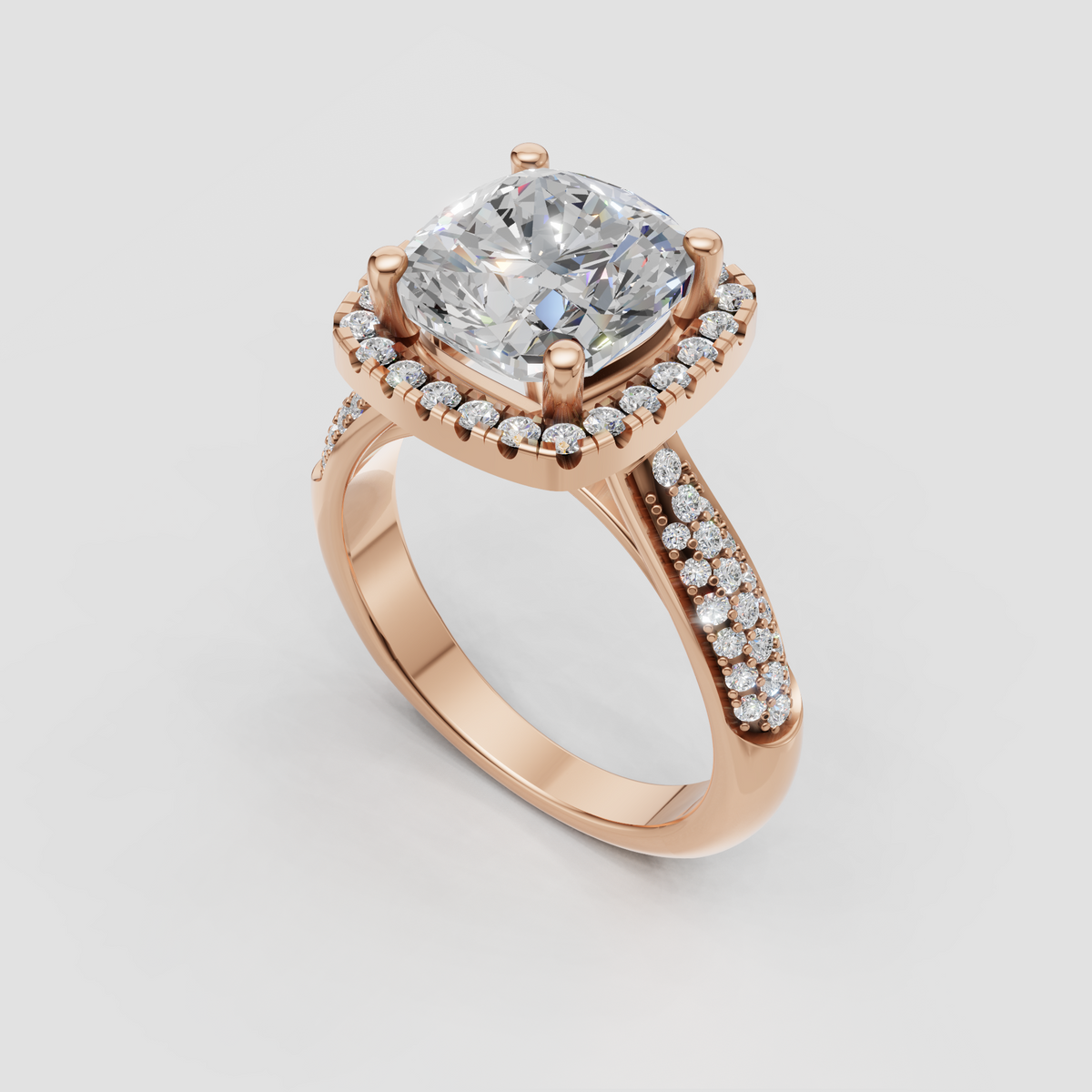 Luxurious yellow gold cushion cut bridal ring with diamond halo