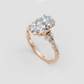 Oval cut diamond ring with marquise and round side stones