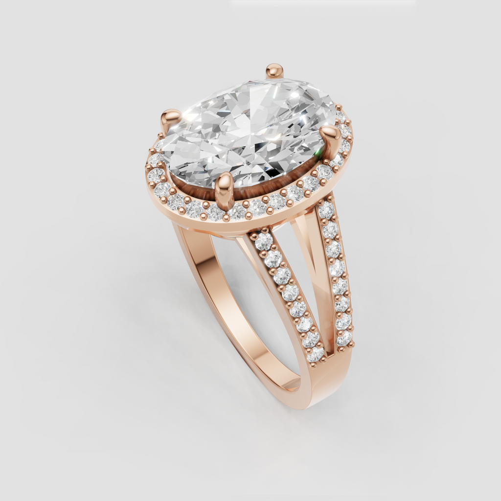 Side view of an oval halo engagement ring showing its raised gallery.