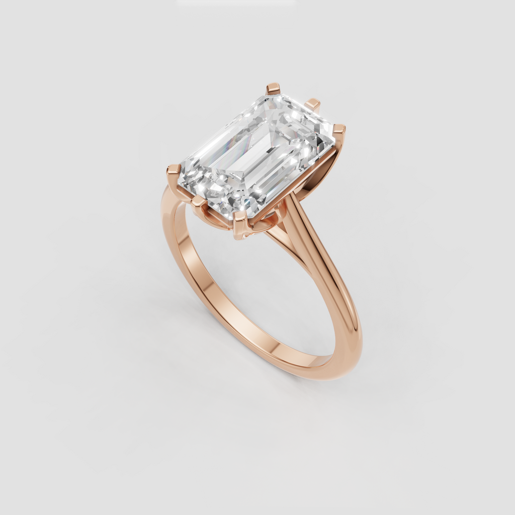 Emerald cut diamond ring with elevated cathedral-inspired setting