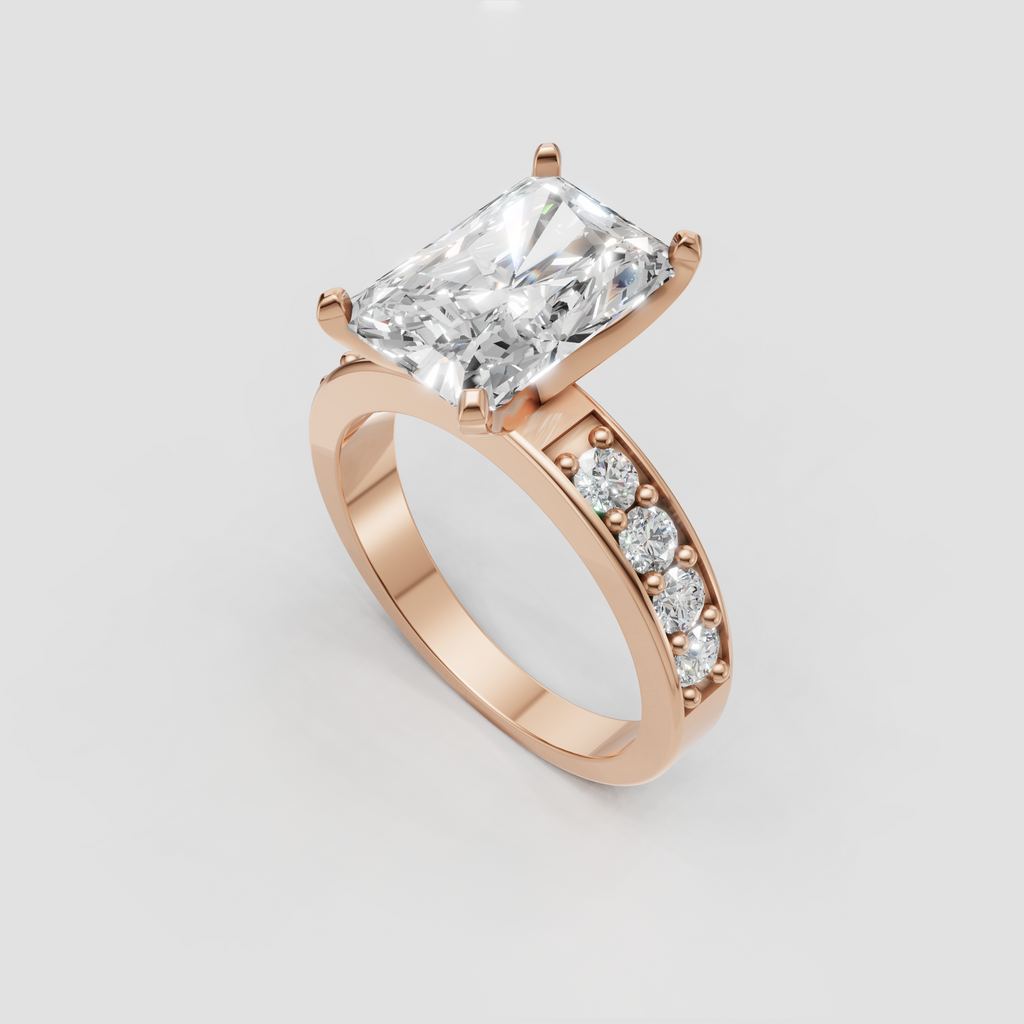 Yellow-gold engagement ring with elongated radiant center stone