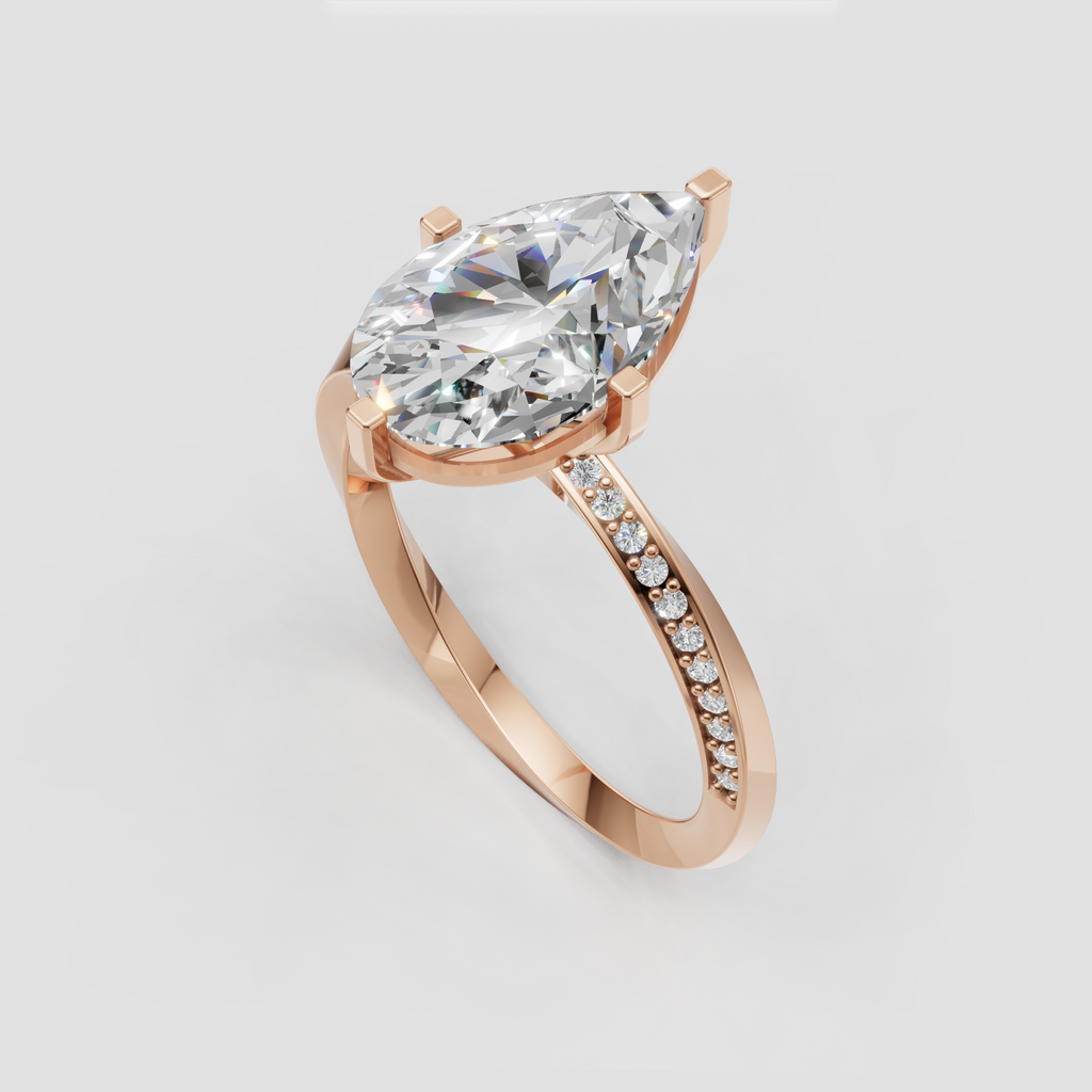 Pear diamond ring with side diamonds