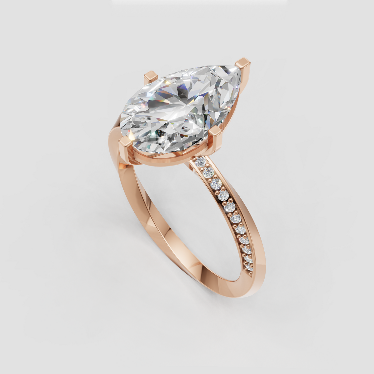 Pear diamond ring with side diamonds