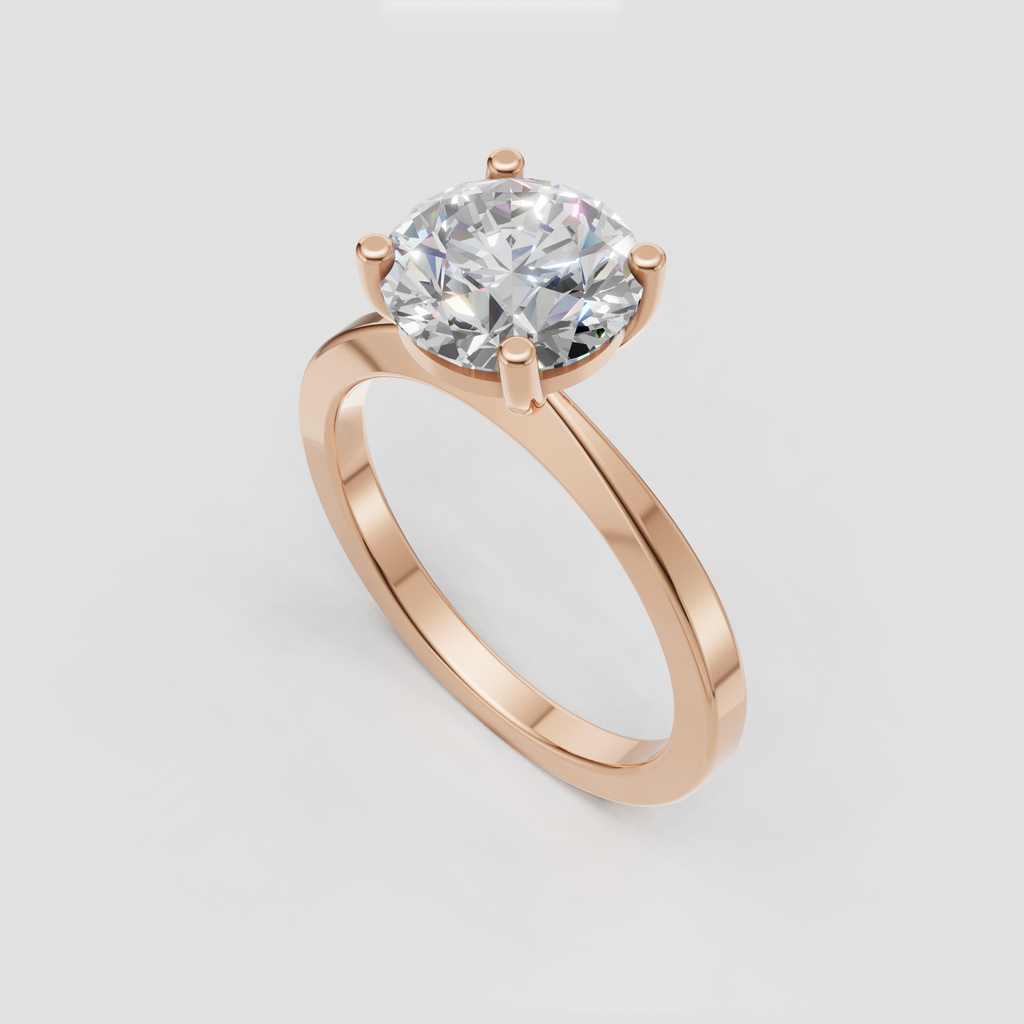 Classic gold solitaire ring featuring a round brilliant center stone