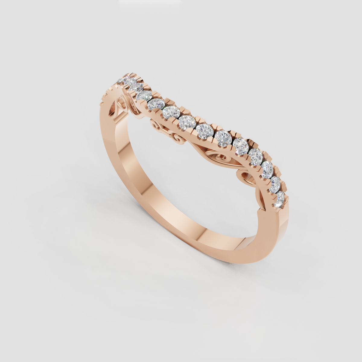 Yellow gold half eternity diamond ring with round stones and symmetrical scroll motifs