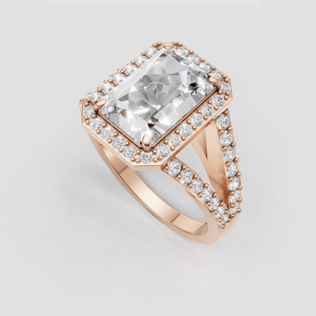 Radiant cut diamond solitaire surrounded by a pave halo