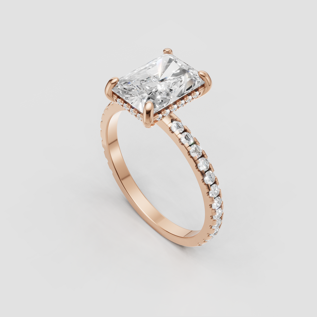 Radiant diamond engagement ring with sparkling stones beneath canter