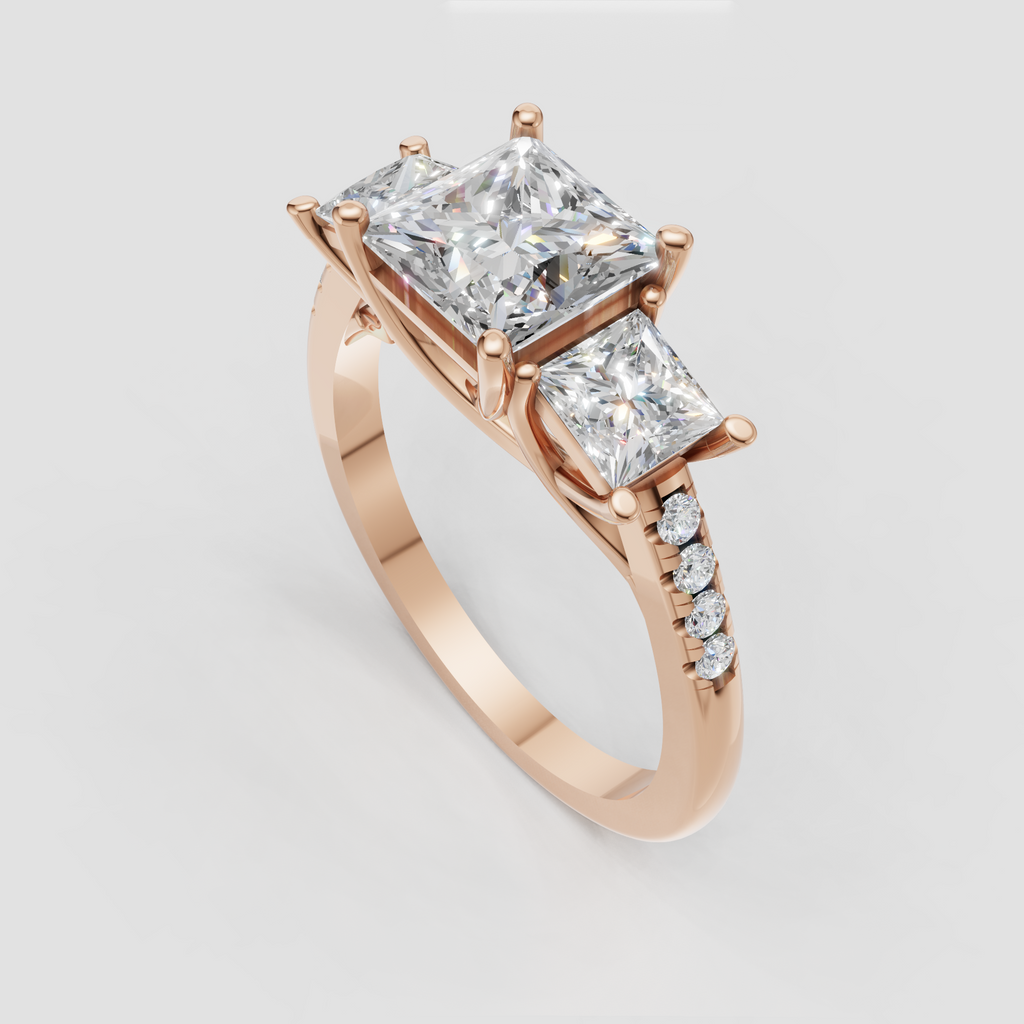 Classic three-stone princess cut diamond ring in polished yellow gold