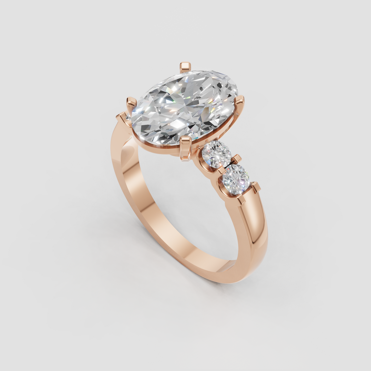Oval diamond bridal ring with graduated round diamonds on both shoulders