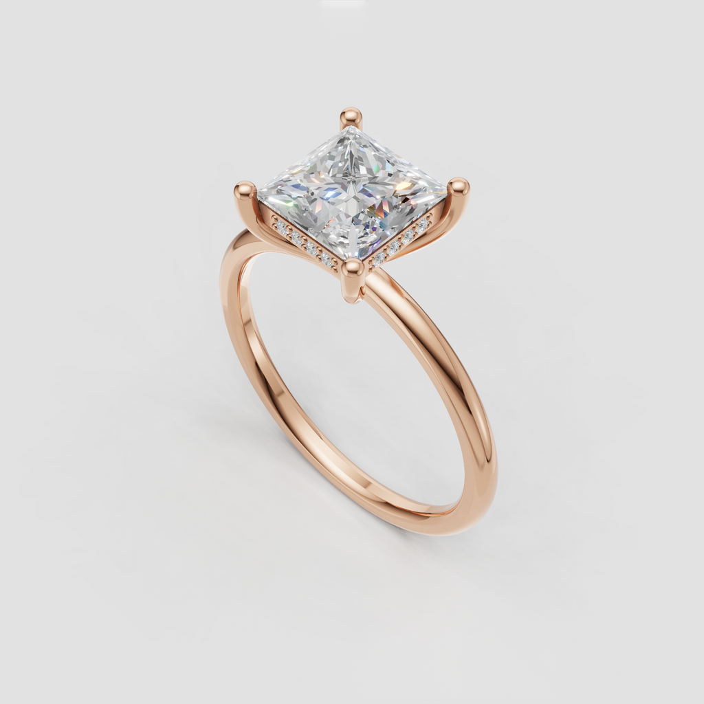 Square princess cut diamond engagement ring with four-prong setting and subtle under-gallery diamonds