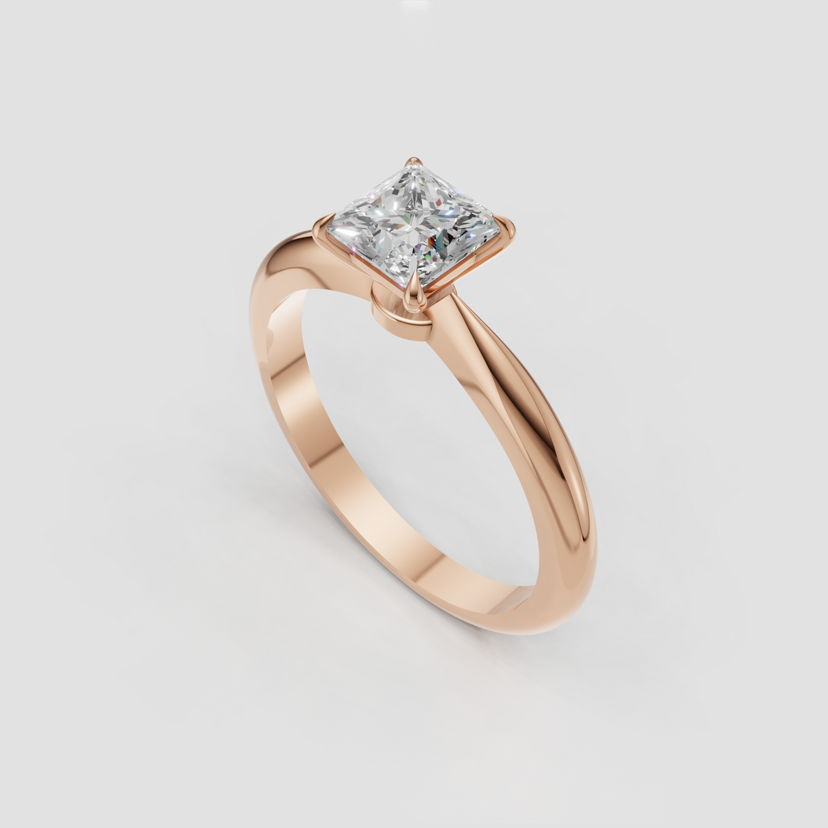 Yellow gold princess cut diamond ring with elevated solitaire setting