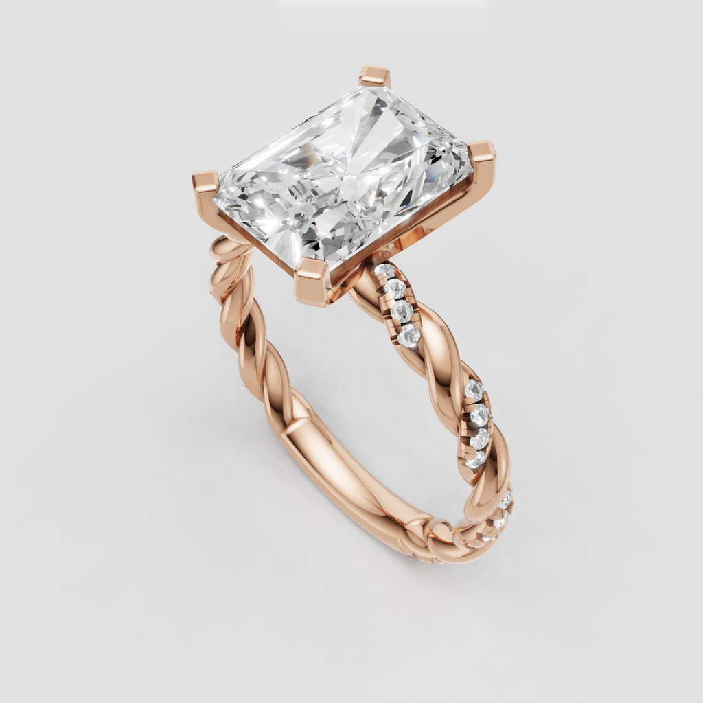 Radiant diamond solitaire ring featuring twisted pavé detailing