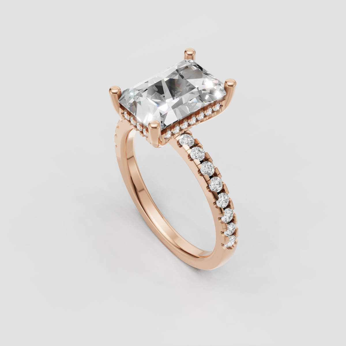 Radiant cut diamond engagement ring with diamond-set band