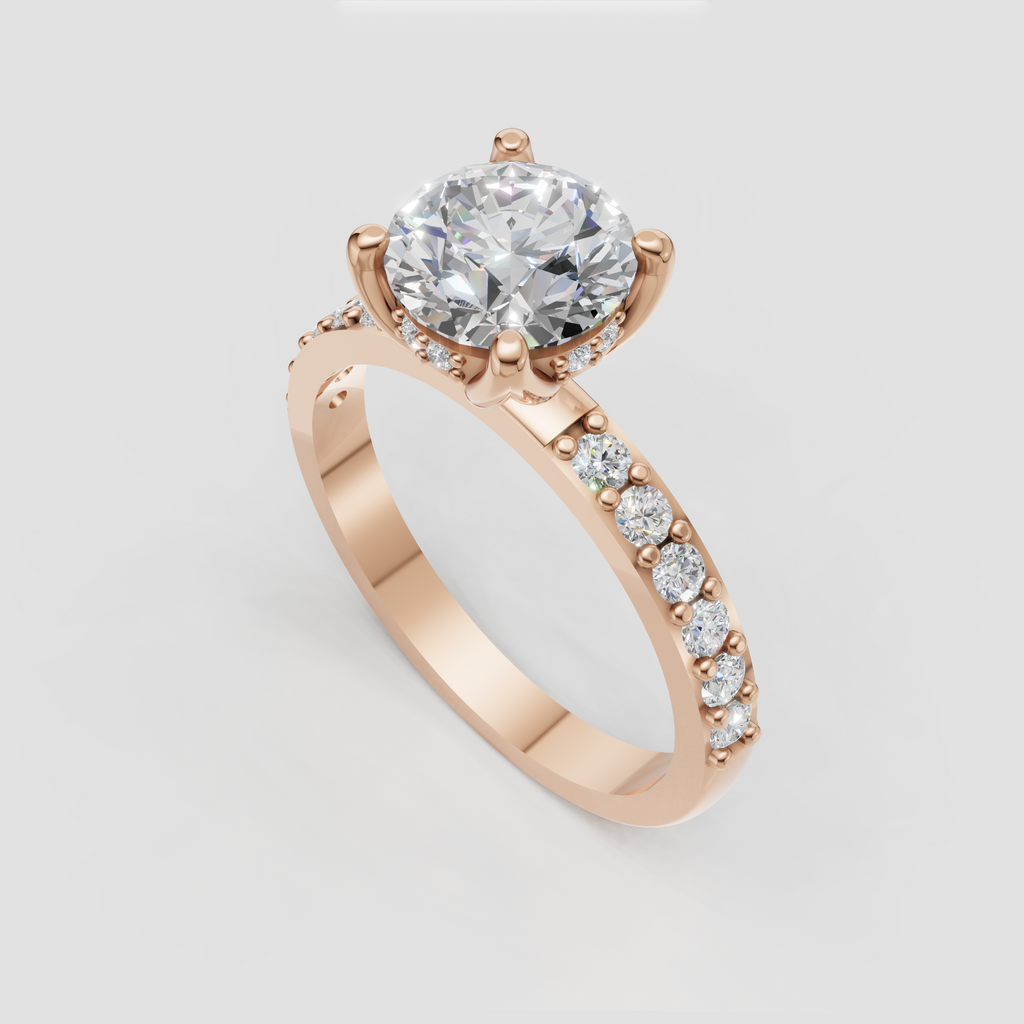 Round brilliant diamond ring with four-prong yellow gold setting