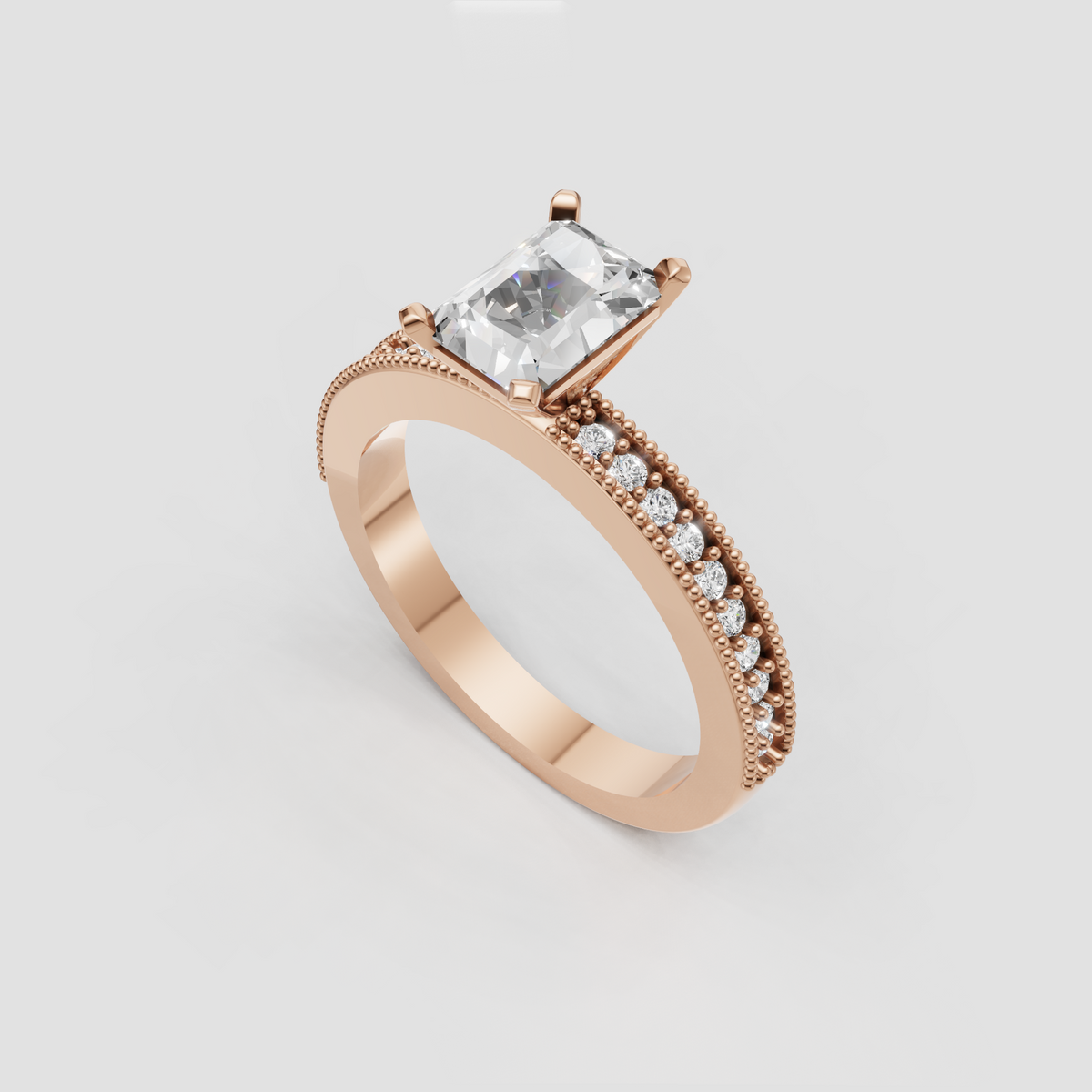 Radiant cut center stone ring with milgrain beadwork and sparkling shoulder diamonds