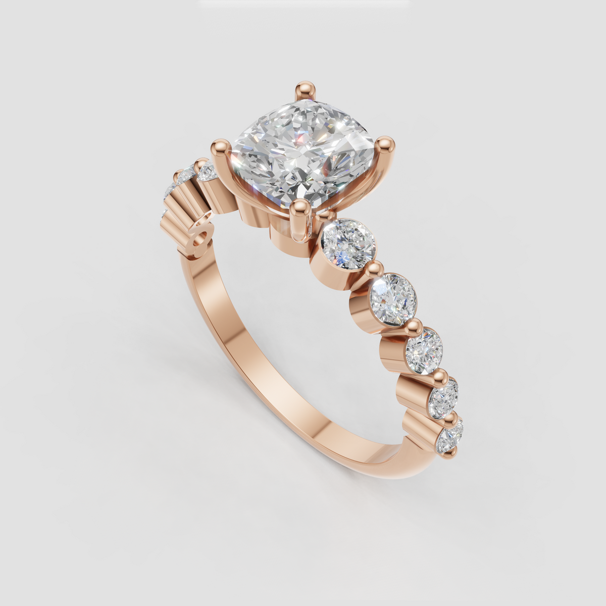 Cushion cut diamond ring with four rounded claw prongs