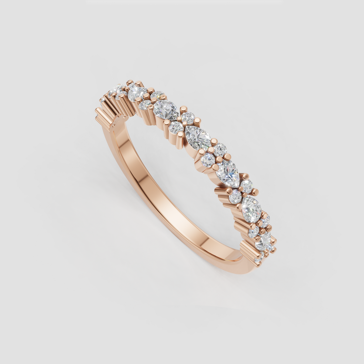 Pear shaped diamond stacking ring in yellow gold