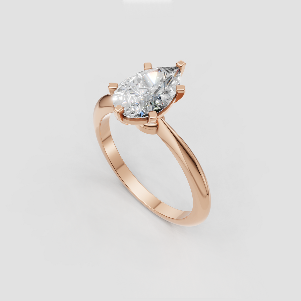 Elegant cathedral pear solitaire ring with clean polished shoulders