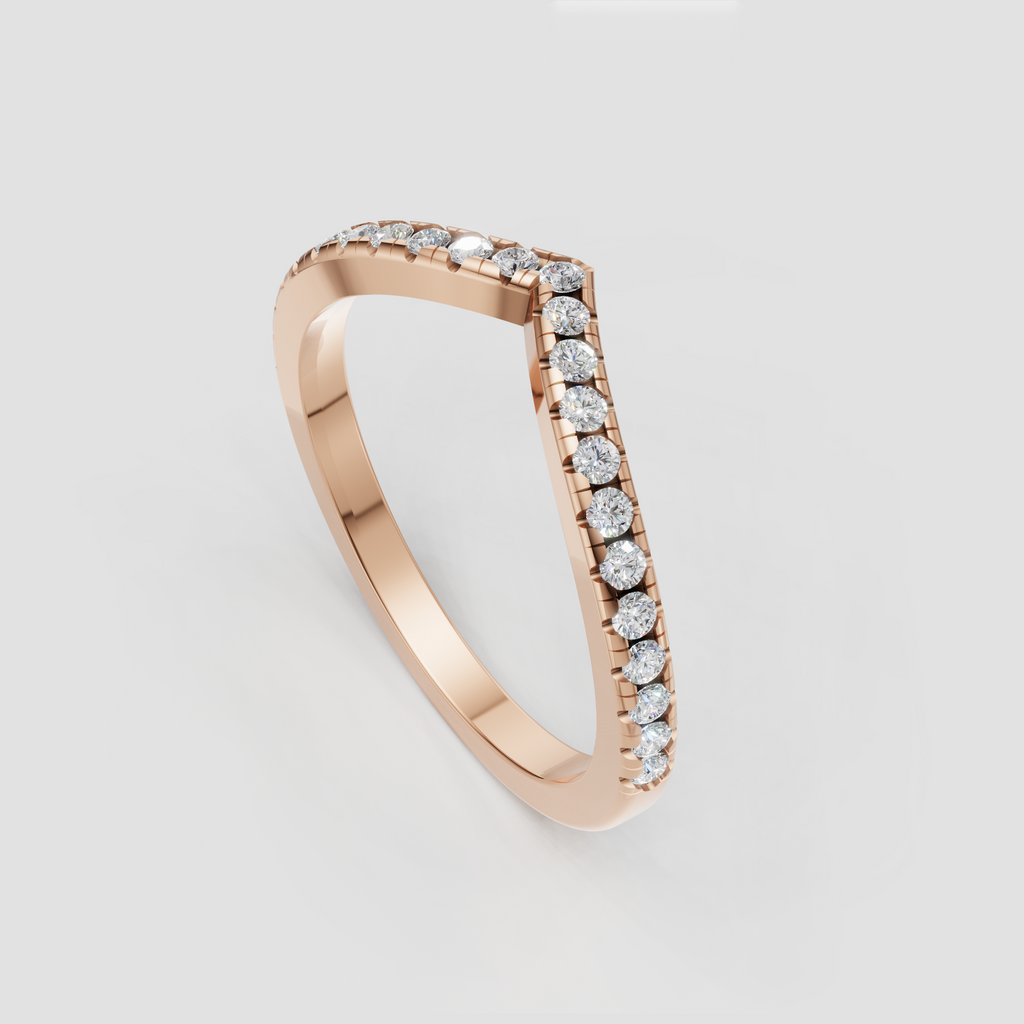 Curved chevron diamond ring with graduated round stones and polished metal