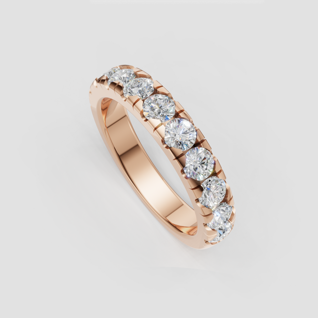 Round stone eternity band with bright polished metal and fine craftsmanship