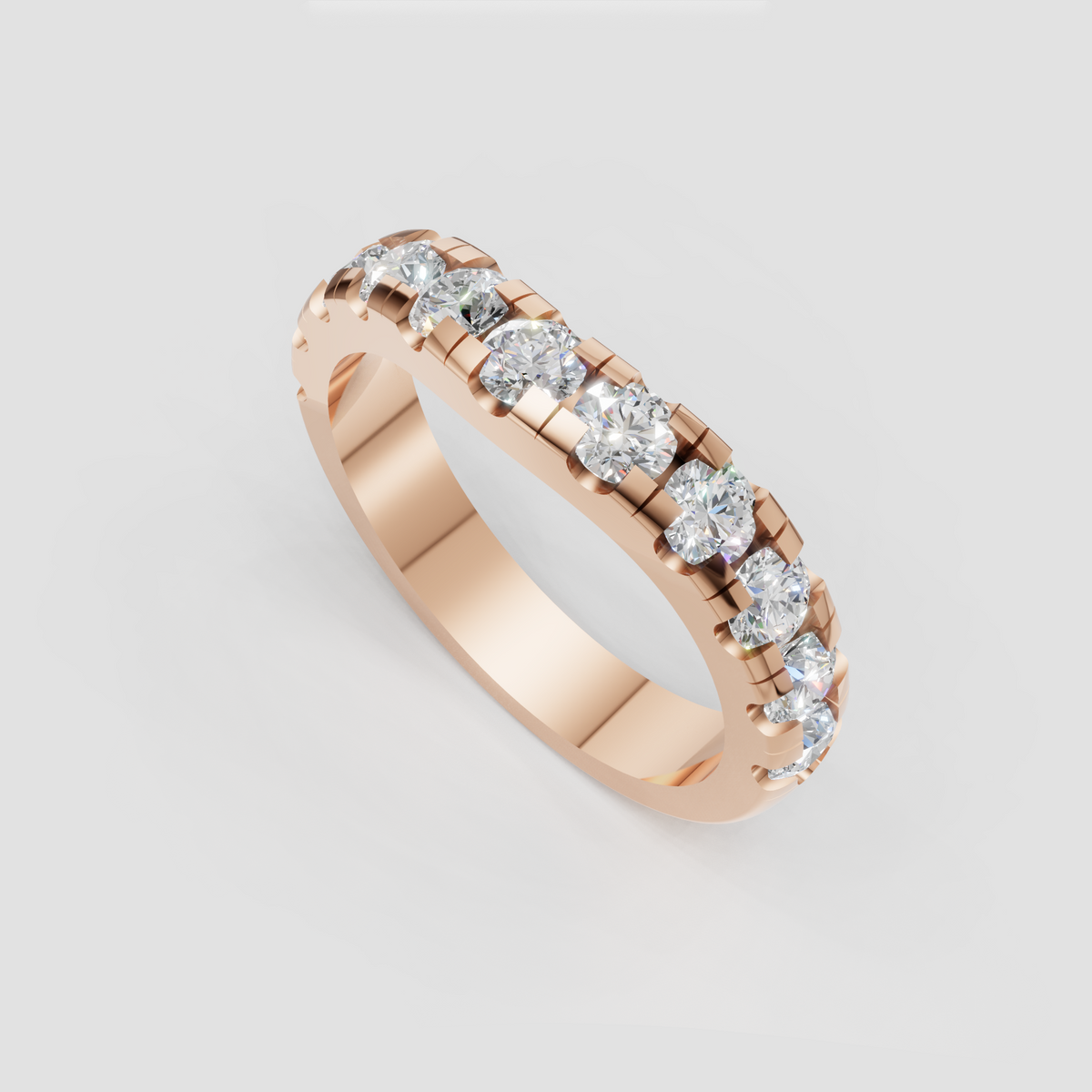 Round diamond wedding ring featuring continuous diamond accents