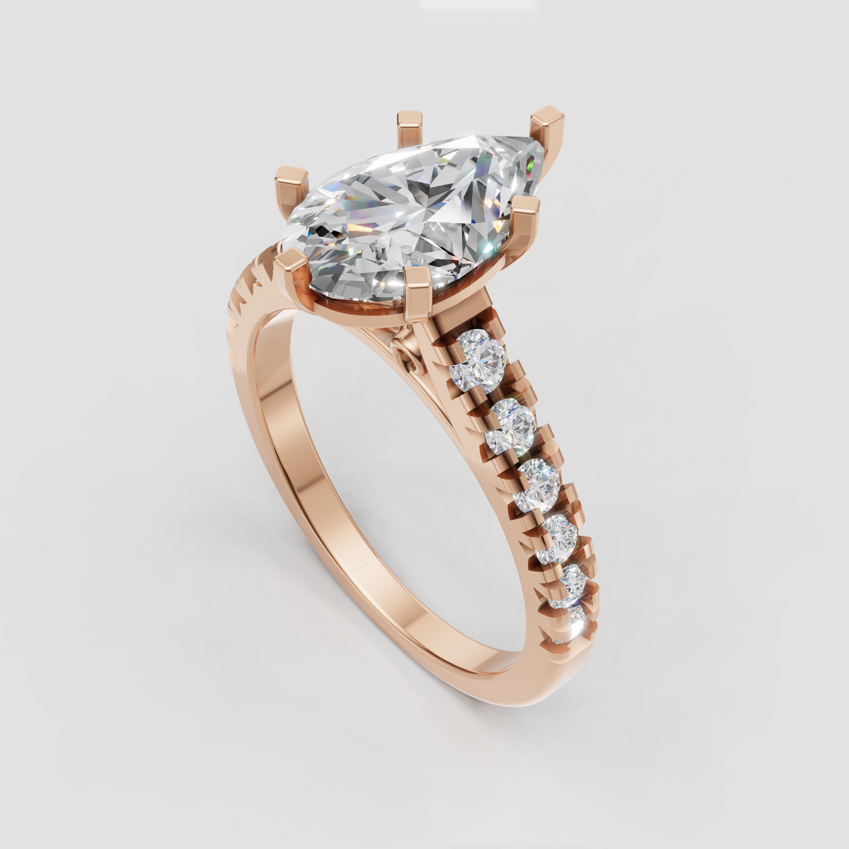 Detailed side profile of pear cut diamond ring showing cathedral arches and decorative scrollwork.