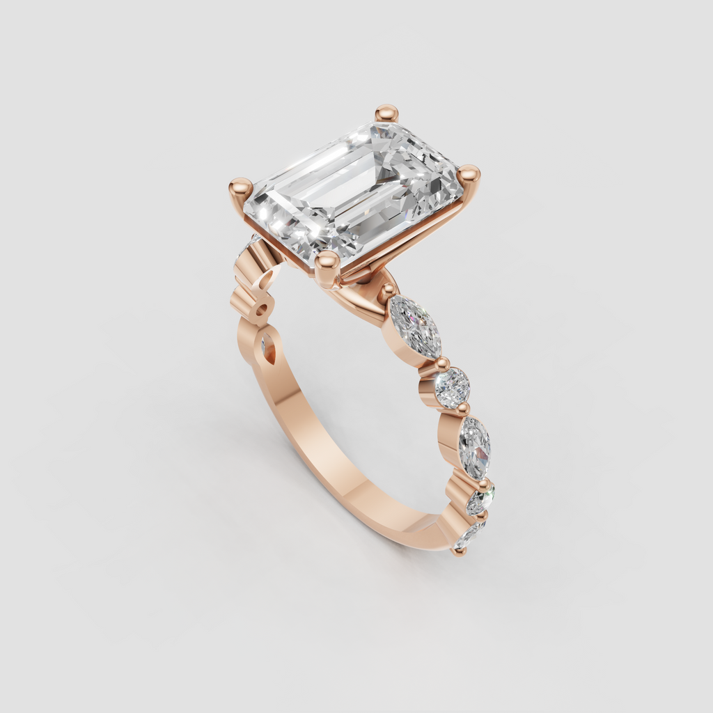 Emerald cut engagement ring with intricate open gallery