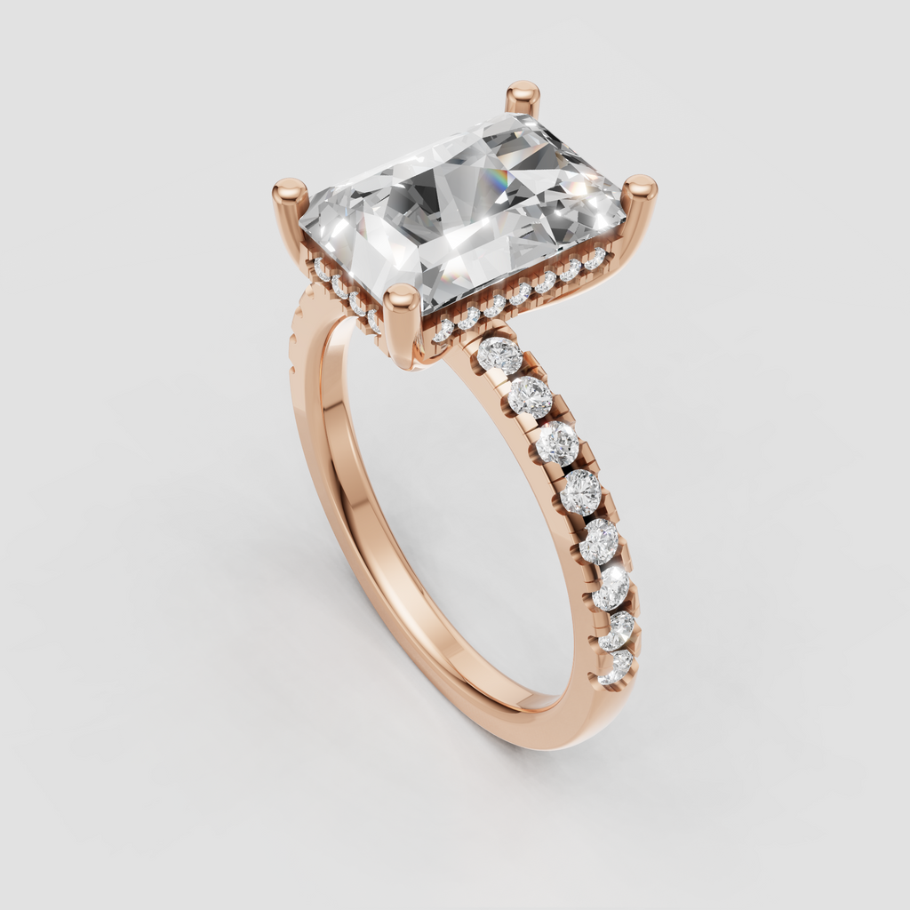 Radiant cut diamond ring viewed from the front with pavé detailing