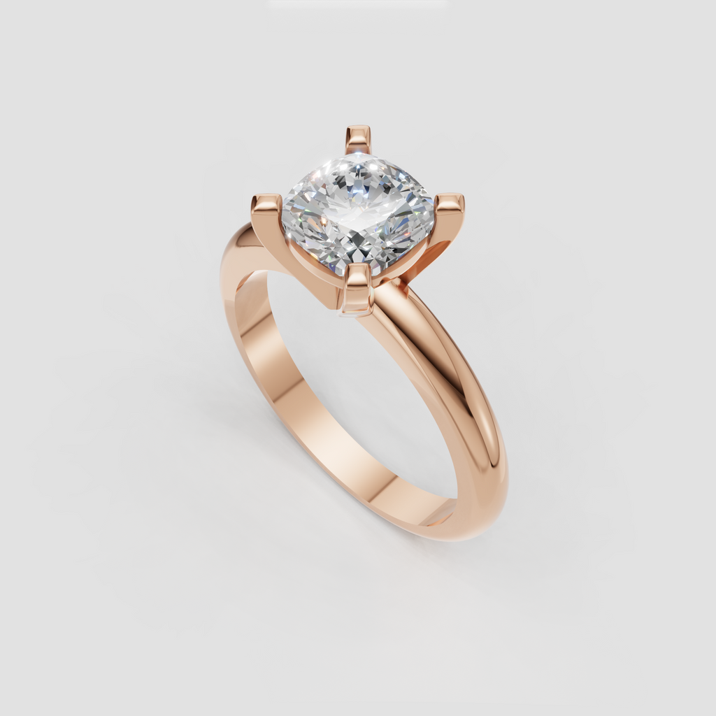 Classic yellow gold solitaire ring with cushion center stone