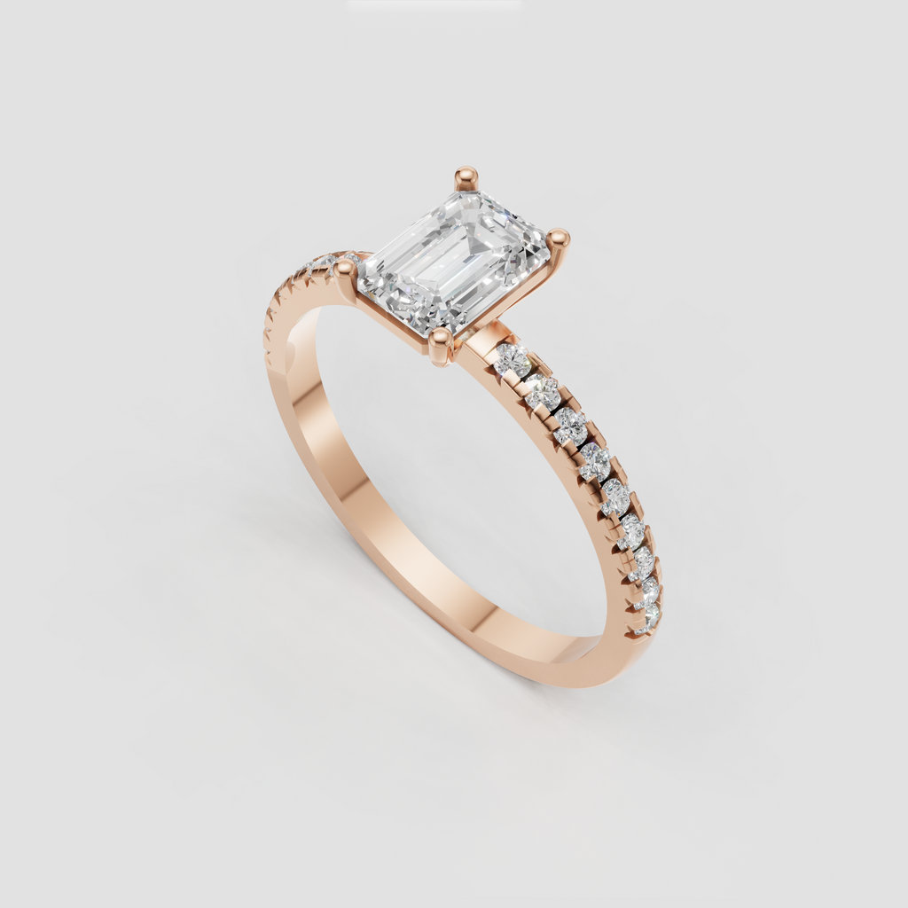 Emerald cut diamond engagement ring in a refined solitaire setting