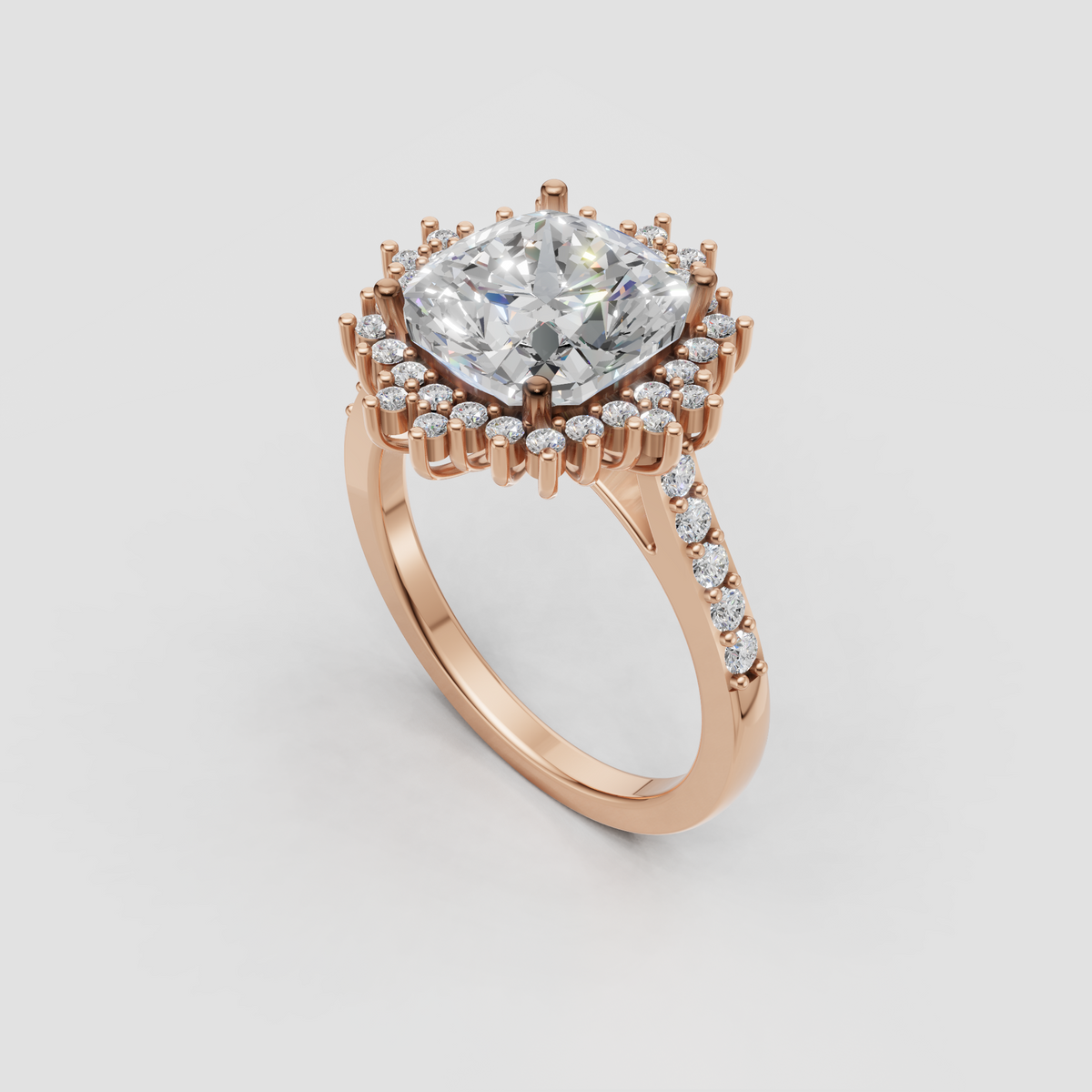 Cushion cut center diamond with intricate round diamond halo