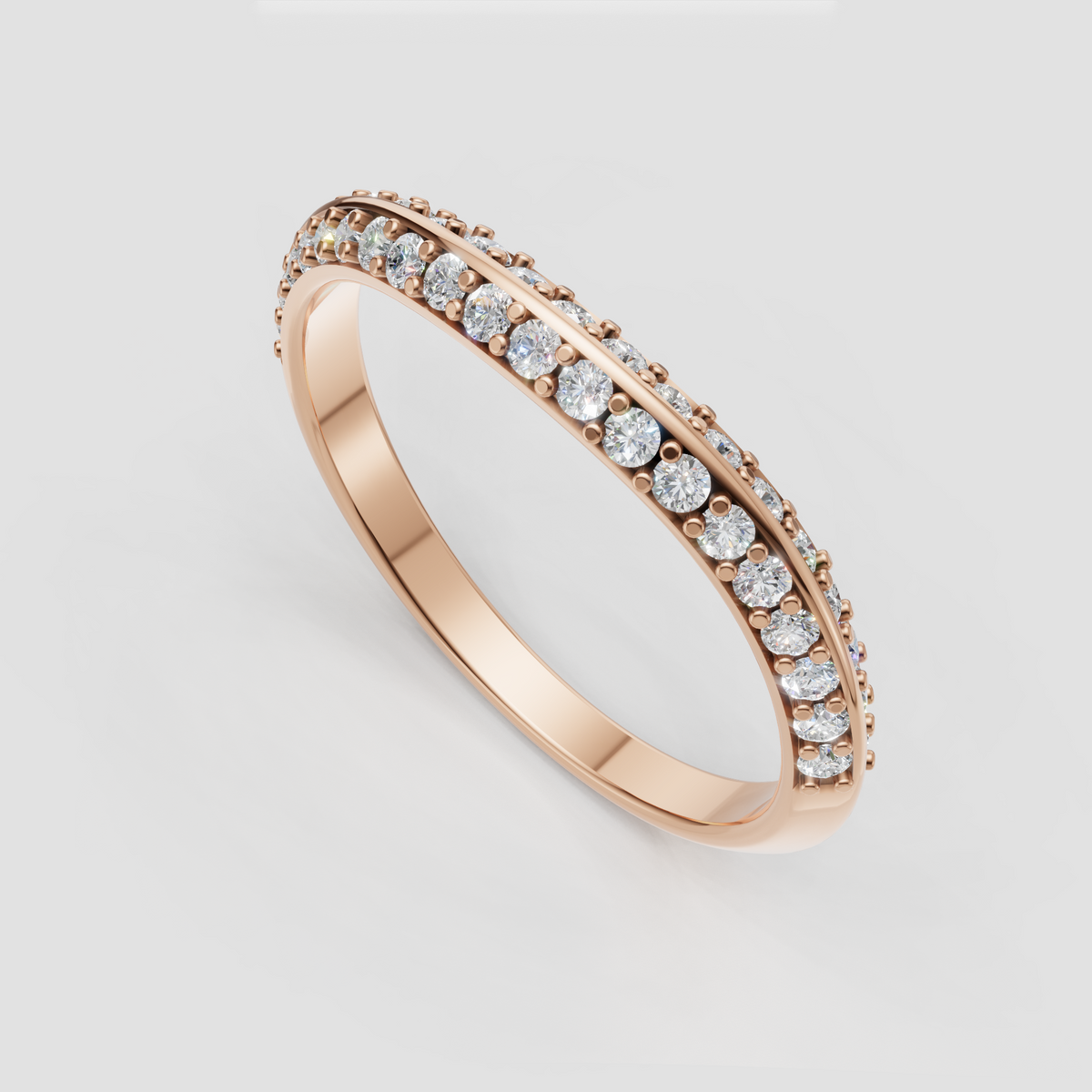 Round diamond band with continuous pavé-style stone setting