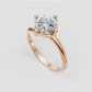 Front view of round diamond crossover engagement ring