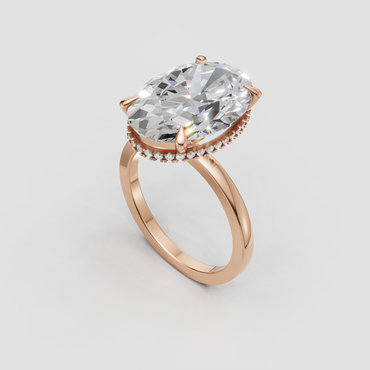 Sophisticated oval cut diamond bridal ring in polished gold