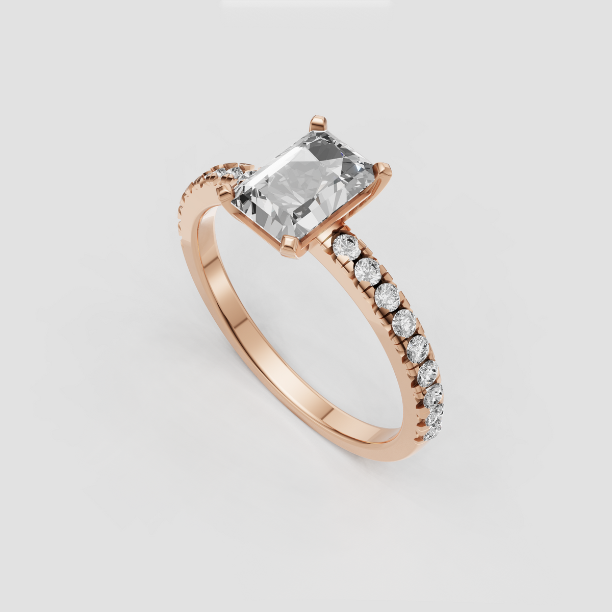 Front view of radiant-cut Diamond solitaire engagement ring with sparkling shank