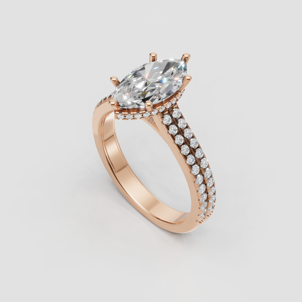 Yellow gold marquise engagement ring with elongated diamond centerpiece