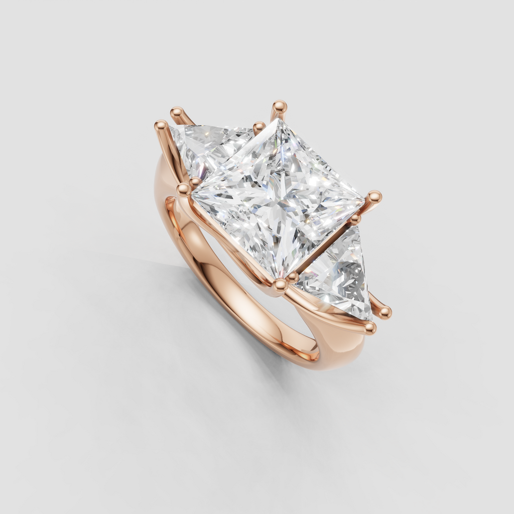 Princess cut diamond ring featuring a polished yellow gold setting