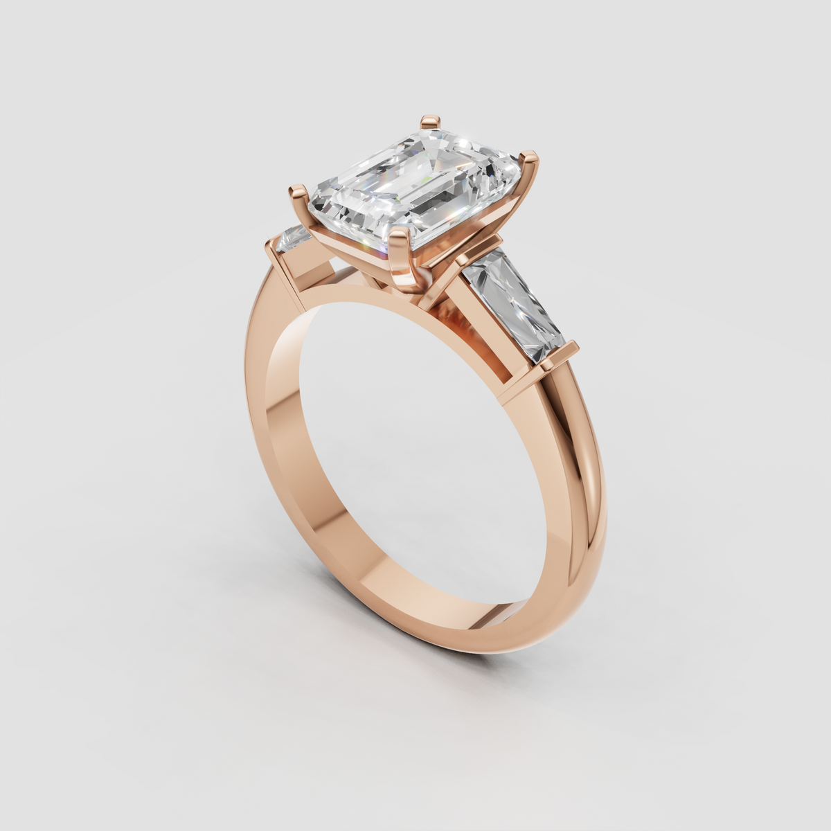 Emerald cut diamond solitaire with baguette side stones and smooth gold band