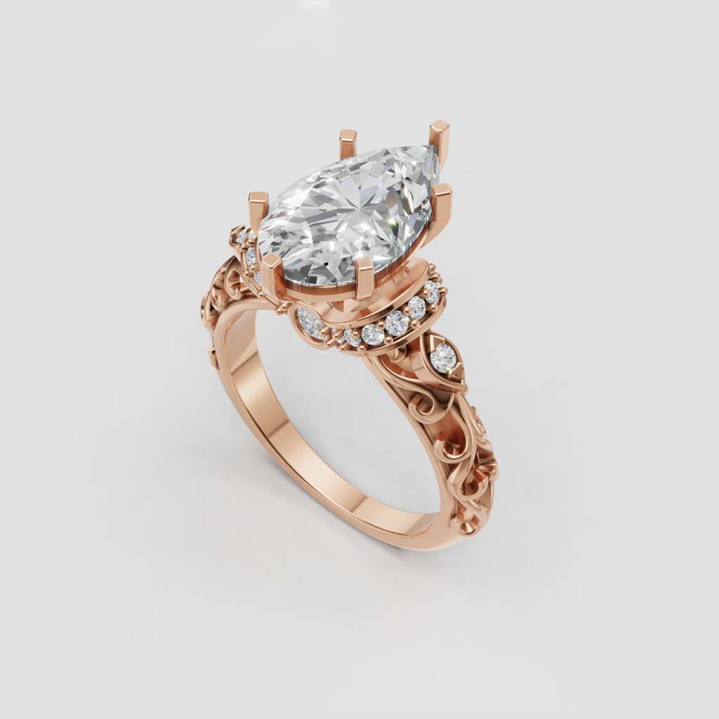 Pear cut diamond bridal ring with intricate open gallery and filigree band