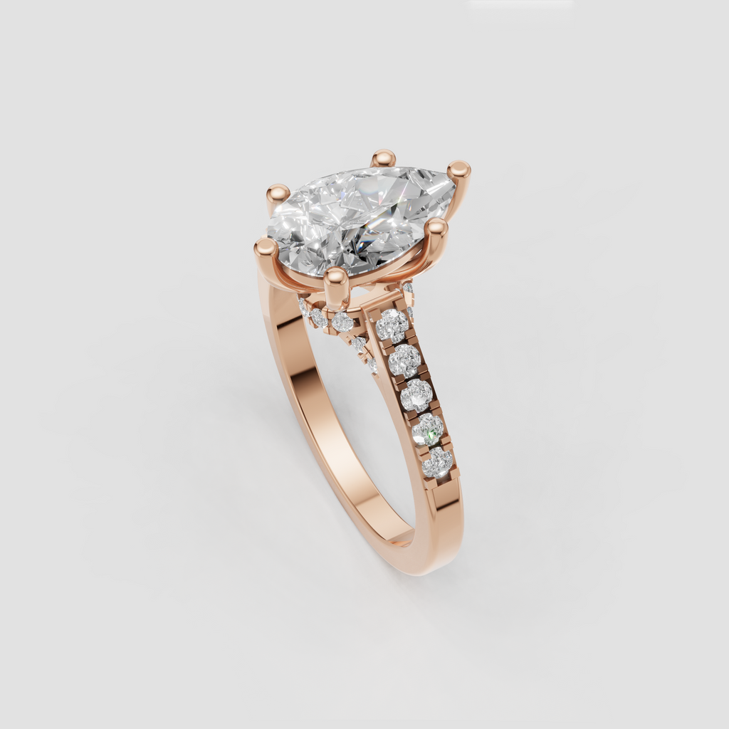 Pear cut engagement ring with symmetrical V-shaped split shank and diamond accents