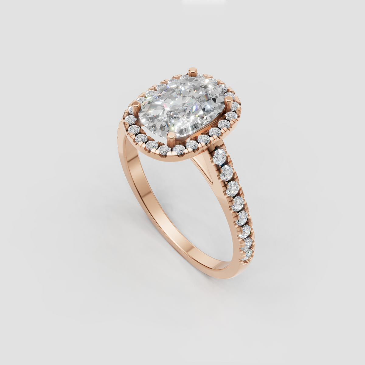 Elongated cushion cut center diamond surrounded by a round diamond halo