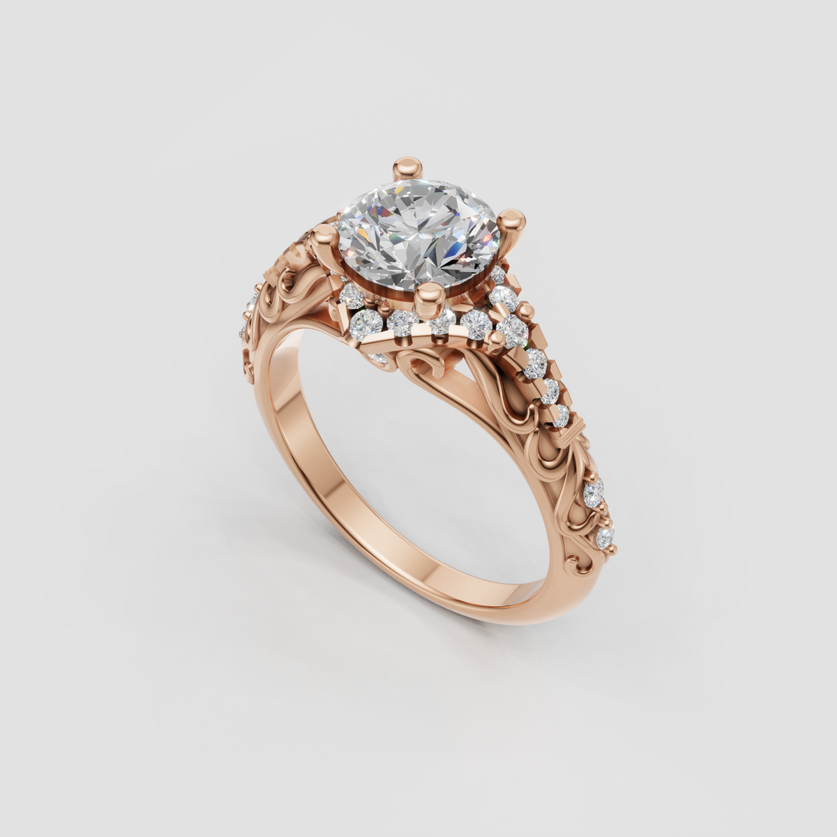 Round diamond prong setting with elaborate yellow gold filigree band