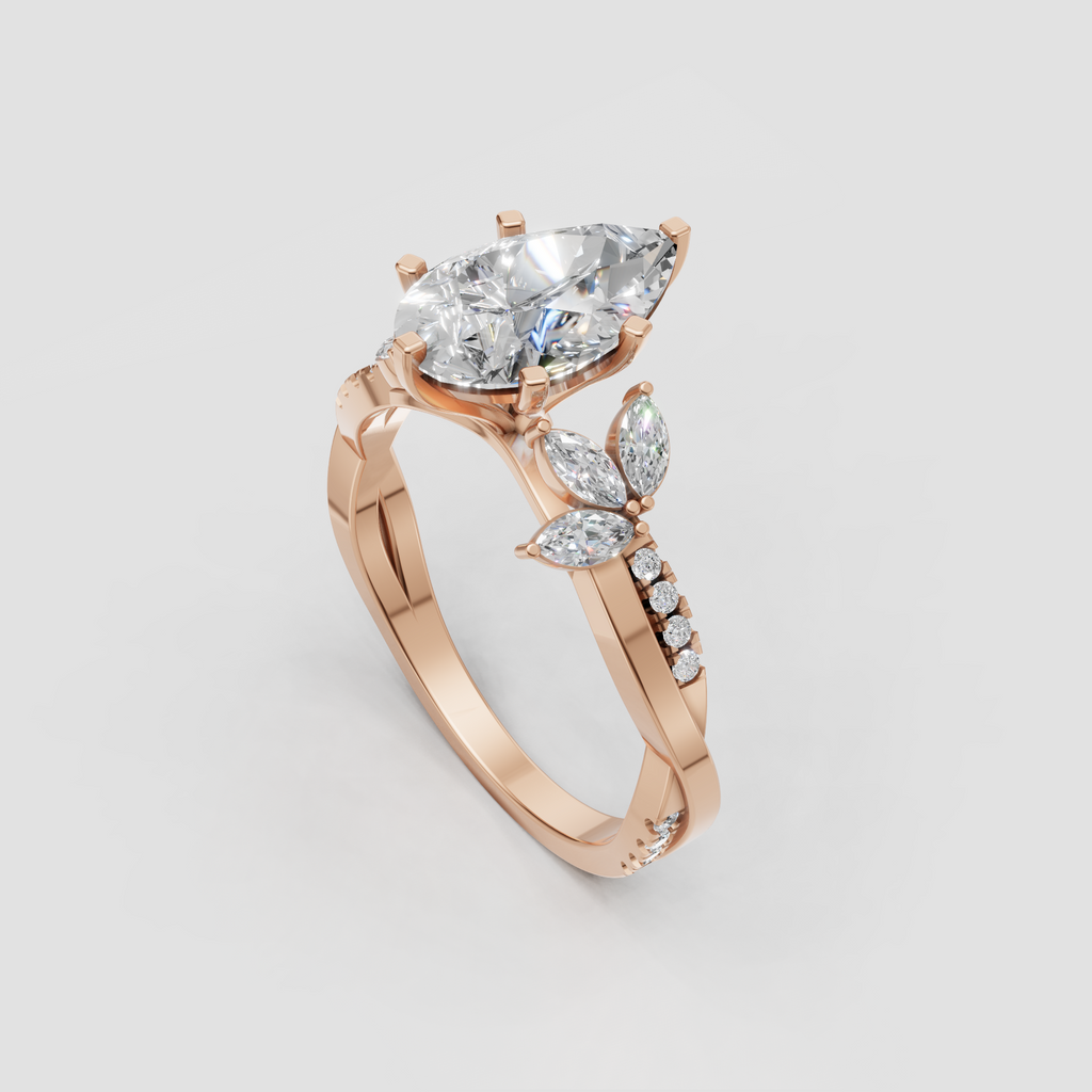 Floral-inspired pear cut diamond ring with marquise side stones