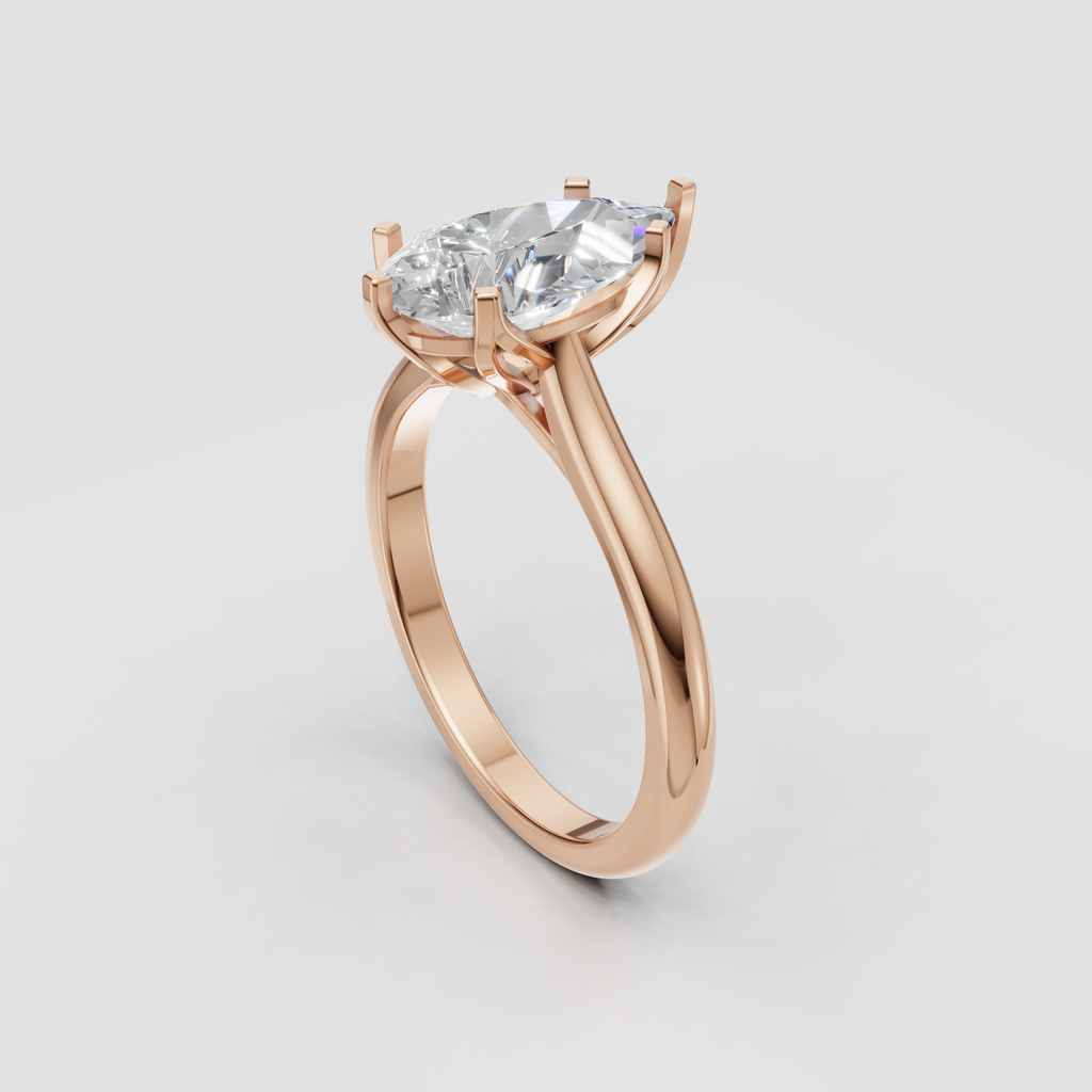 Polished yellow gold solitaire ring with pear cut center stone