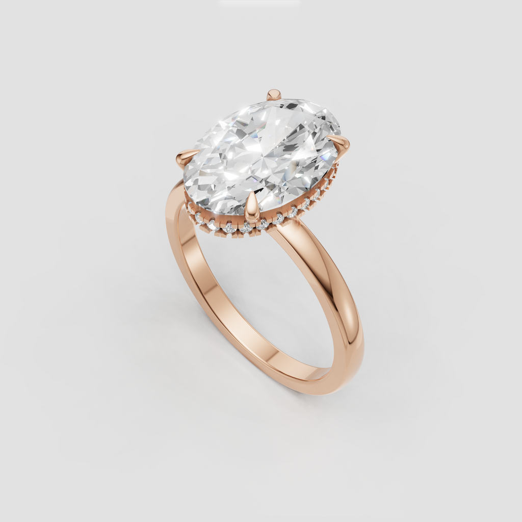Sophisticated oval diamond ring with hidden halo