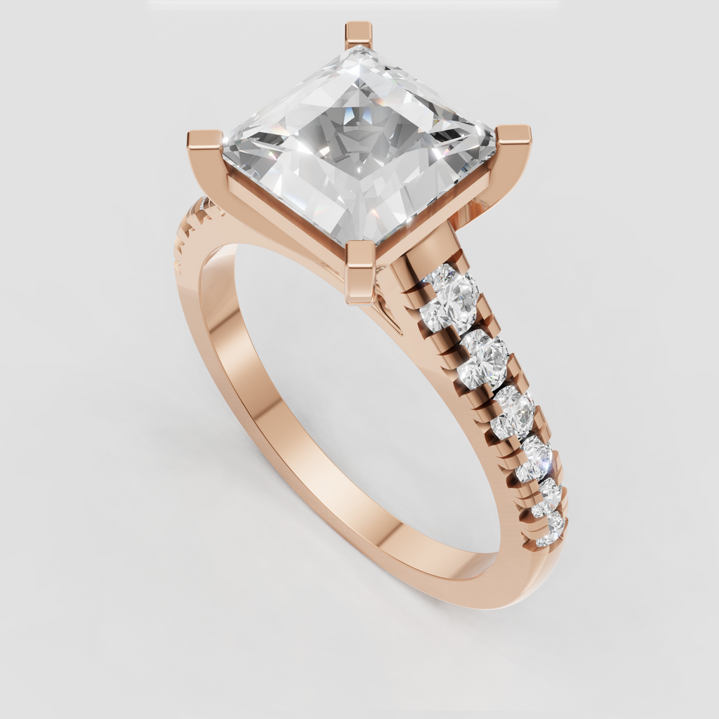 Radiant diamond bridal ring with detailed open gallery beneath the center