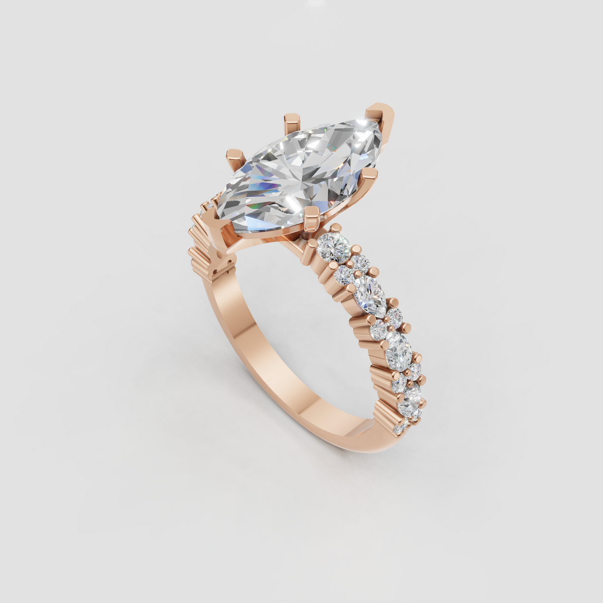 Close-up marquise cut diamond engagement ring with yellow gold setting