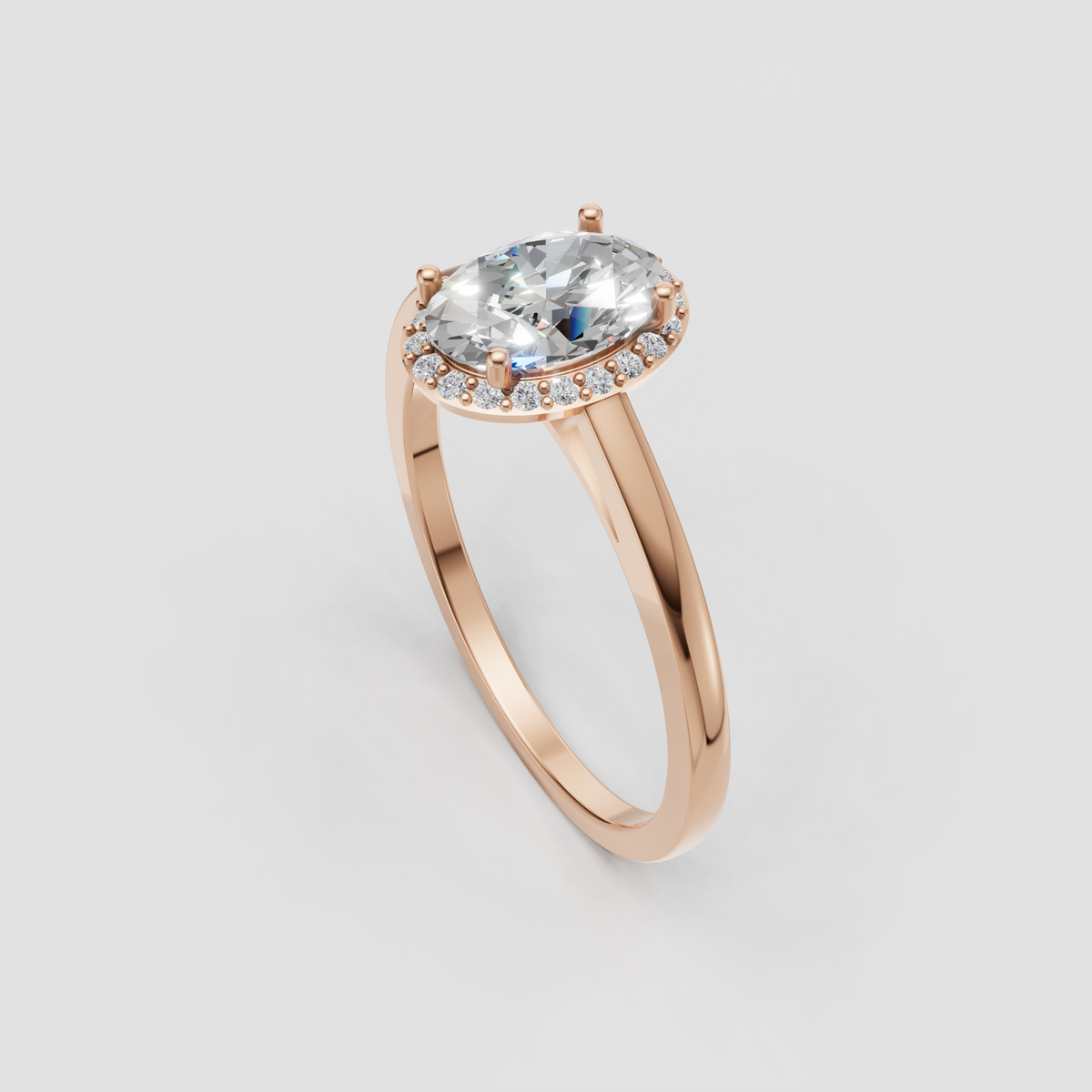Oval cut engagement ring with sparkling round stones surrounding the center