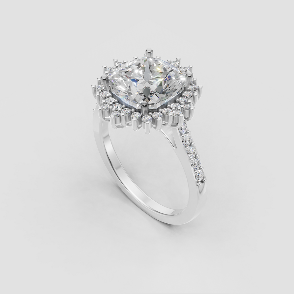 Cushion diamond cluster ring with pavé-set shoulder diamonds